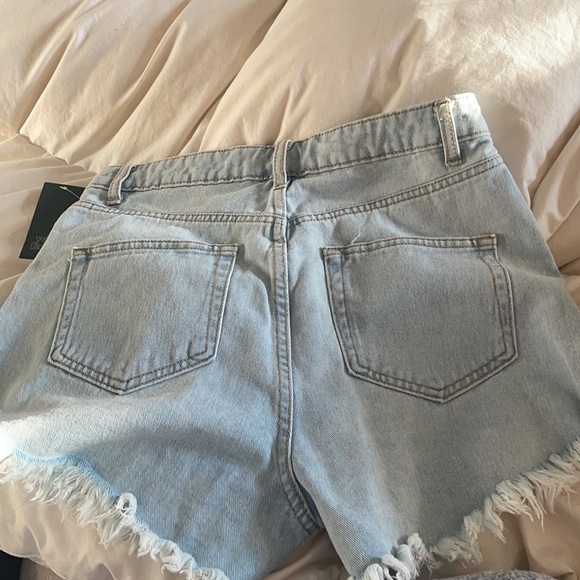New still with the tag, denim shorts - Picture 2 of 4